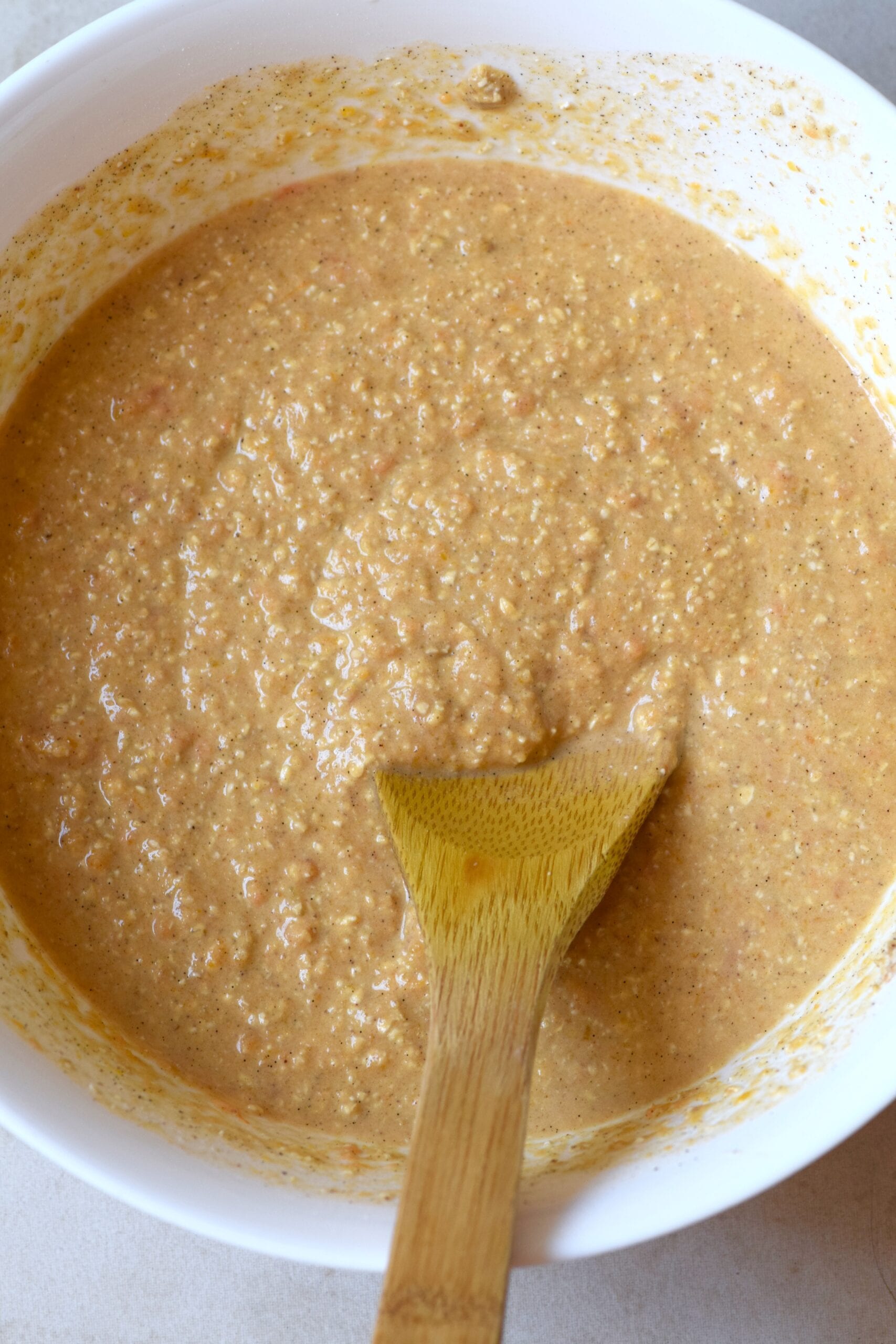 Pancake batter in a white mixing bowl