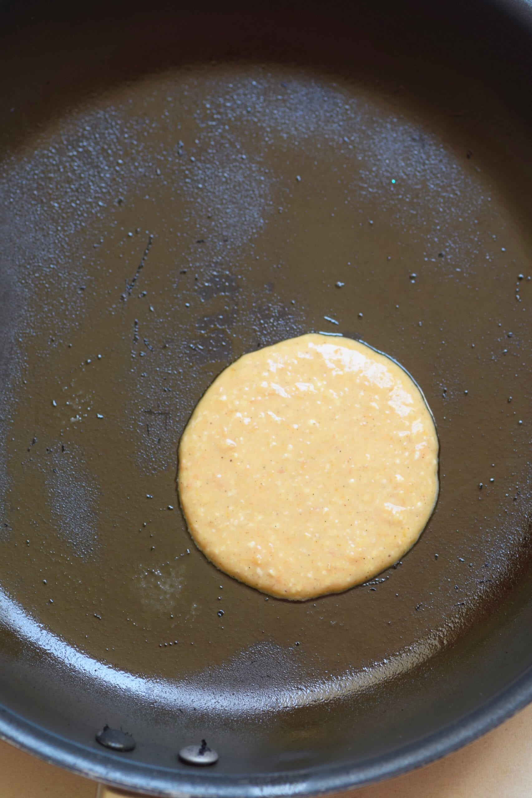 Pancake batter on frying pan