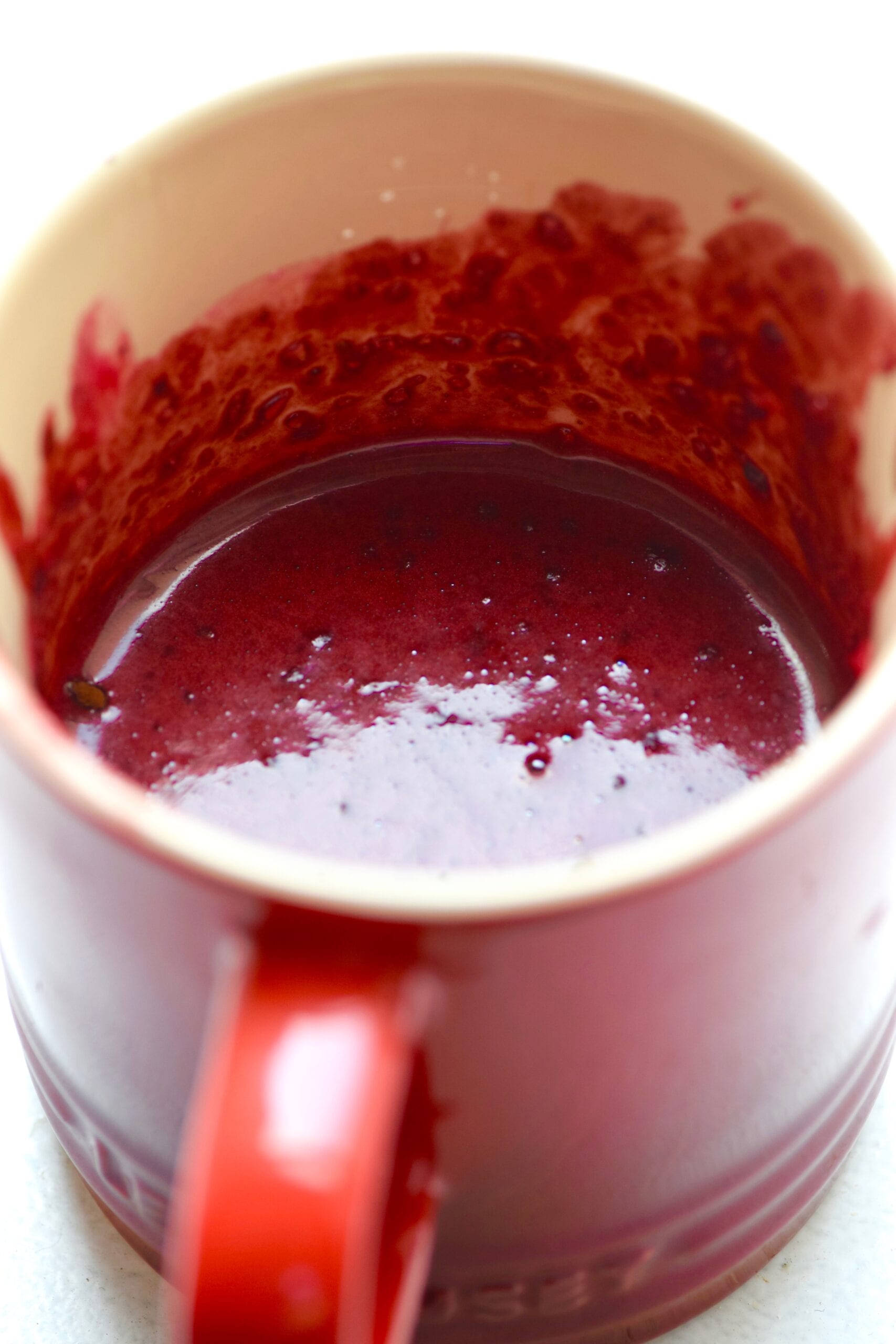 Mixing all ingredients for the red velvet mug cake