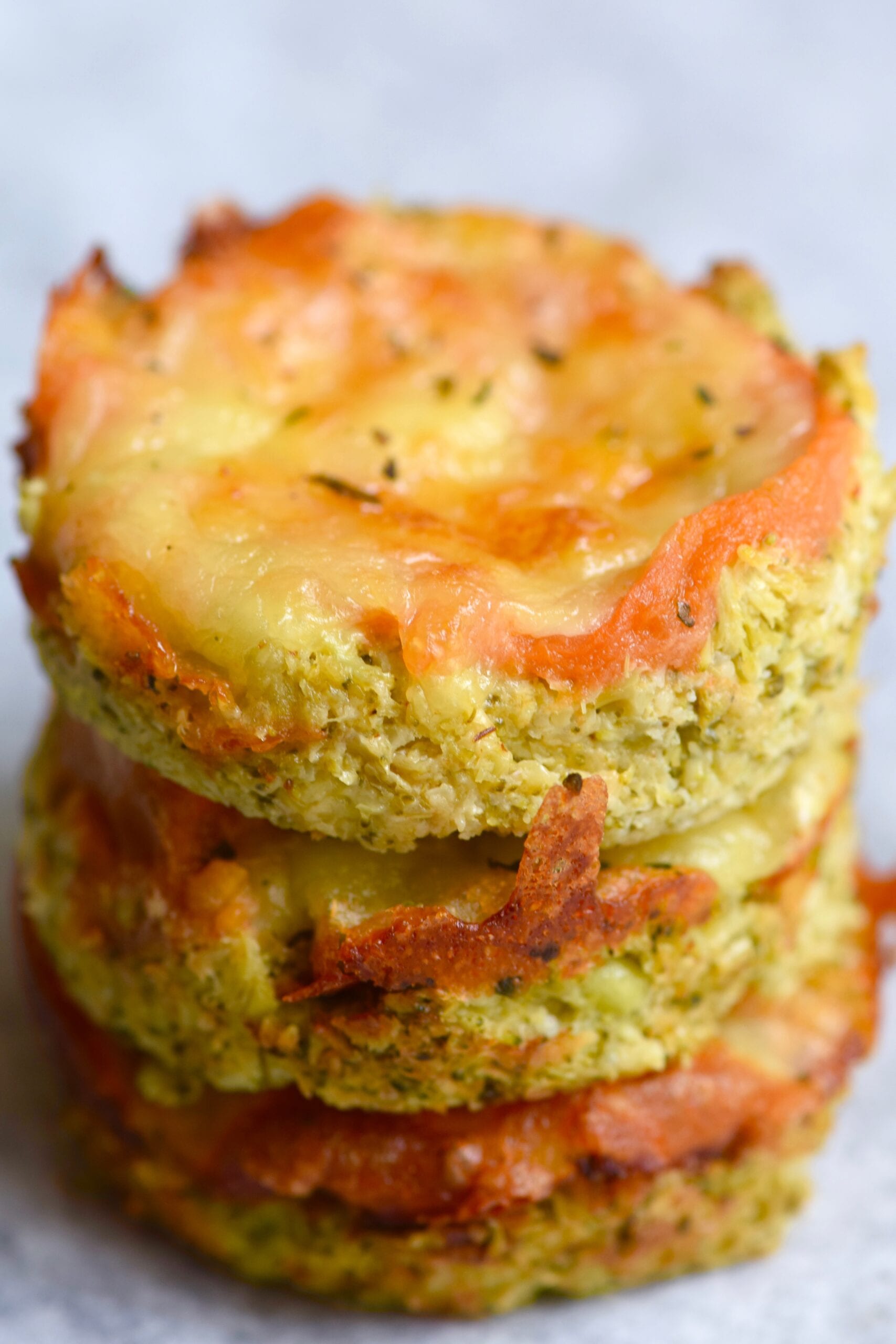 Stack of low carb mini cauliflower pizzas