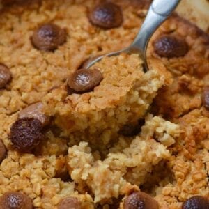 Spoon scooping chocolate chip baked oatmeal