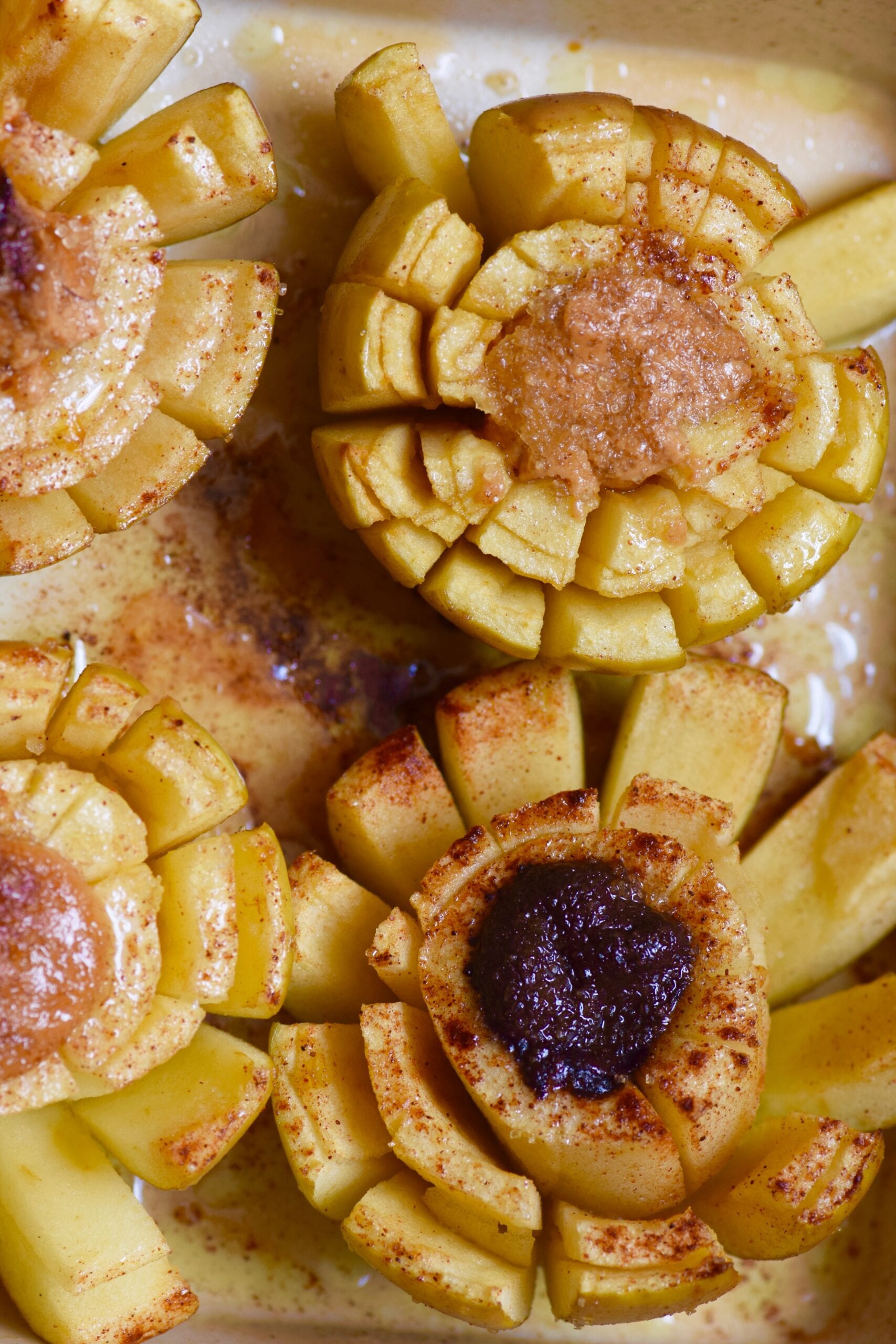 Baked blooming apple stuffed wth caramel and chocolate