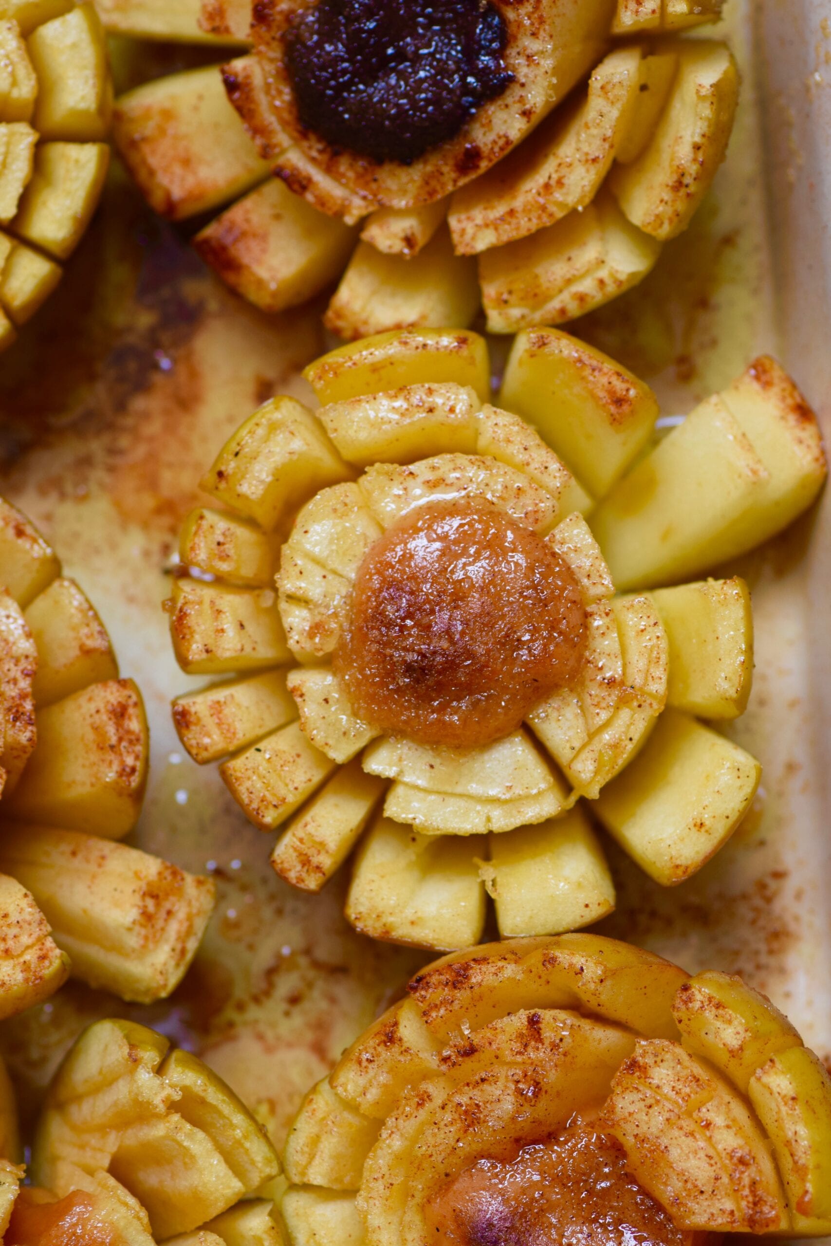 Blooming baked apple stuffed with caramel sauce
