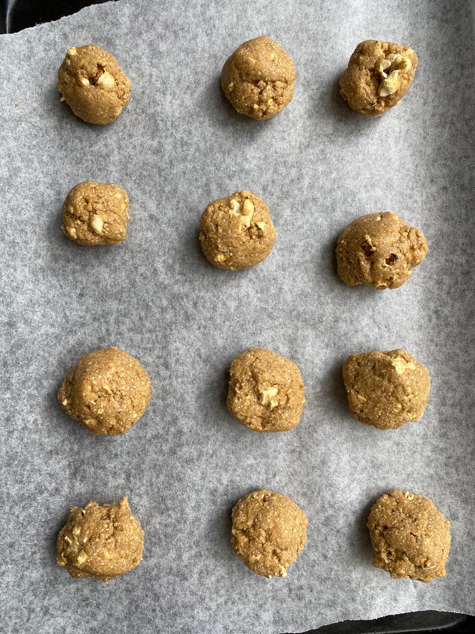 rolling the cookie dough into balls