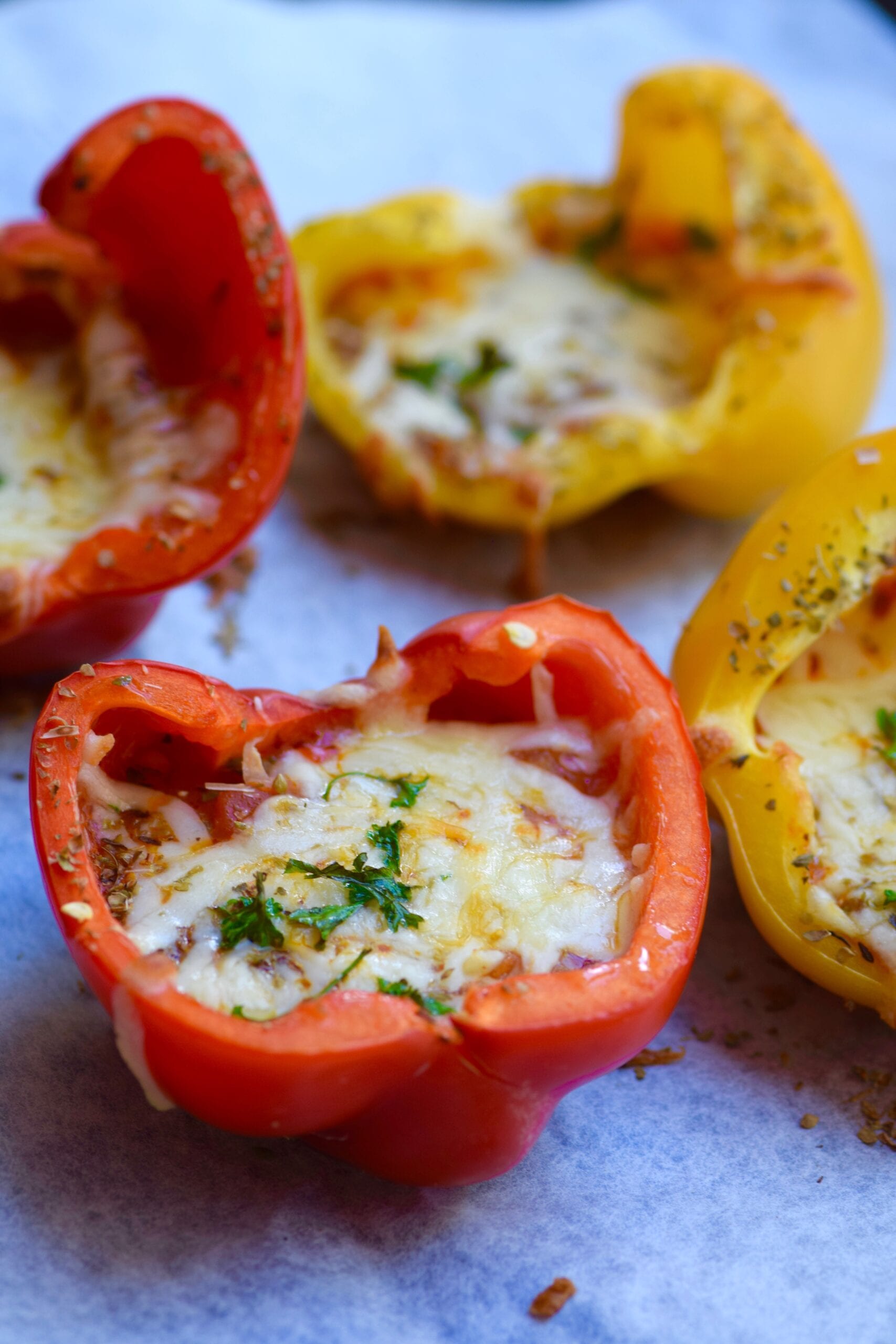 Baked yellow and red bell pepper pizzas