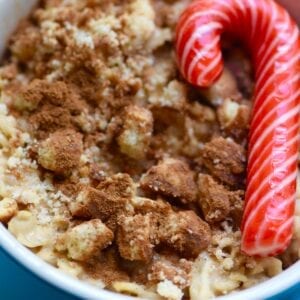 Gingerbread overnight oatmeal with a red candy cane