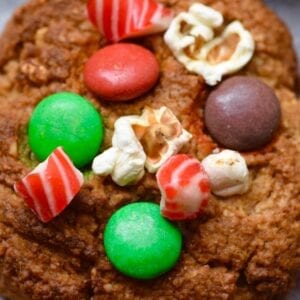 Easy Christmas cookies with popcorn, coloured candy and candy canes
