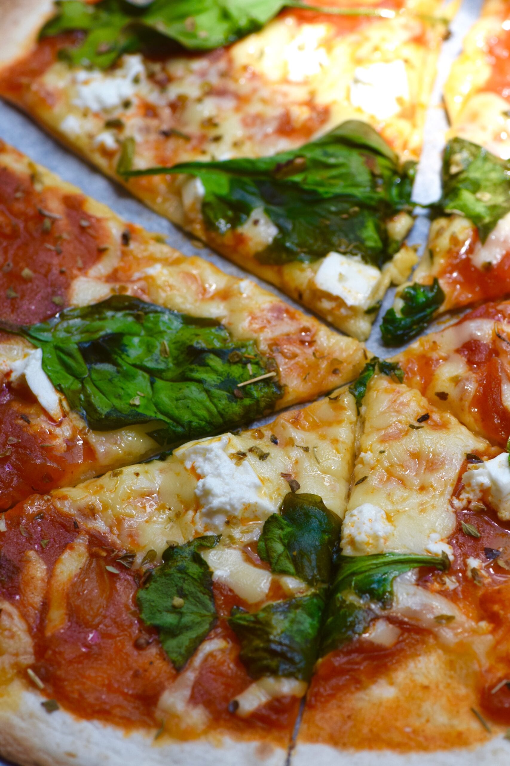 Low calorie spinach and feta pizza slices