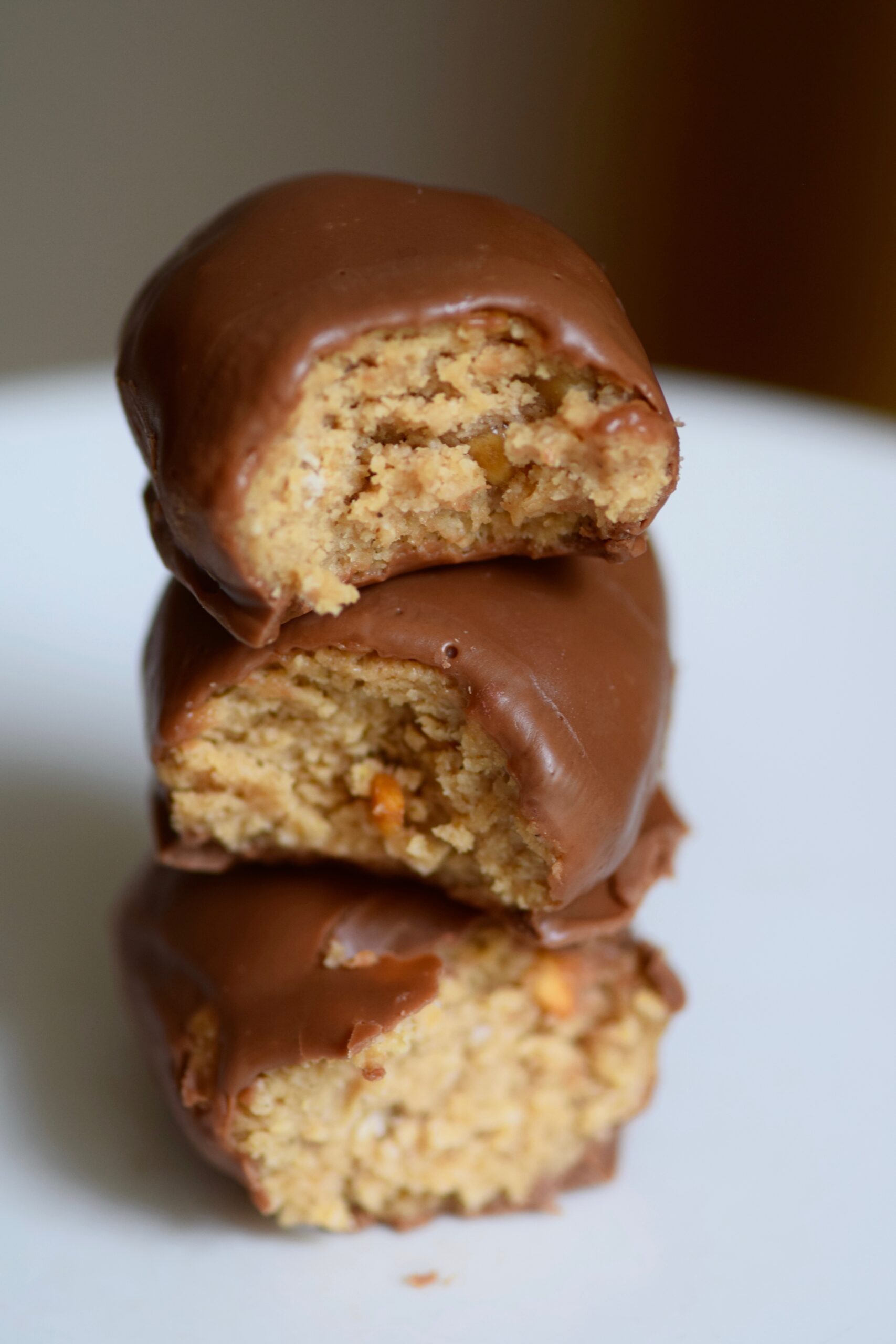 Copycat Reese’s Peanut Butter Protein Bars with bites out of it