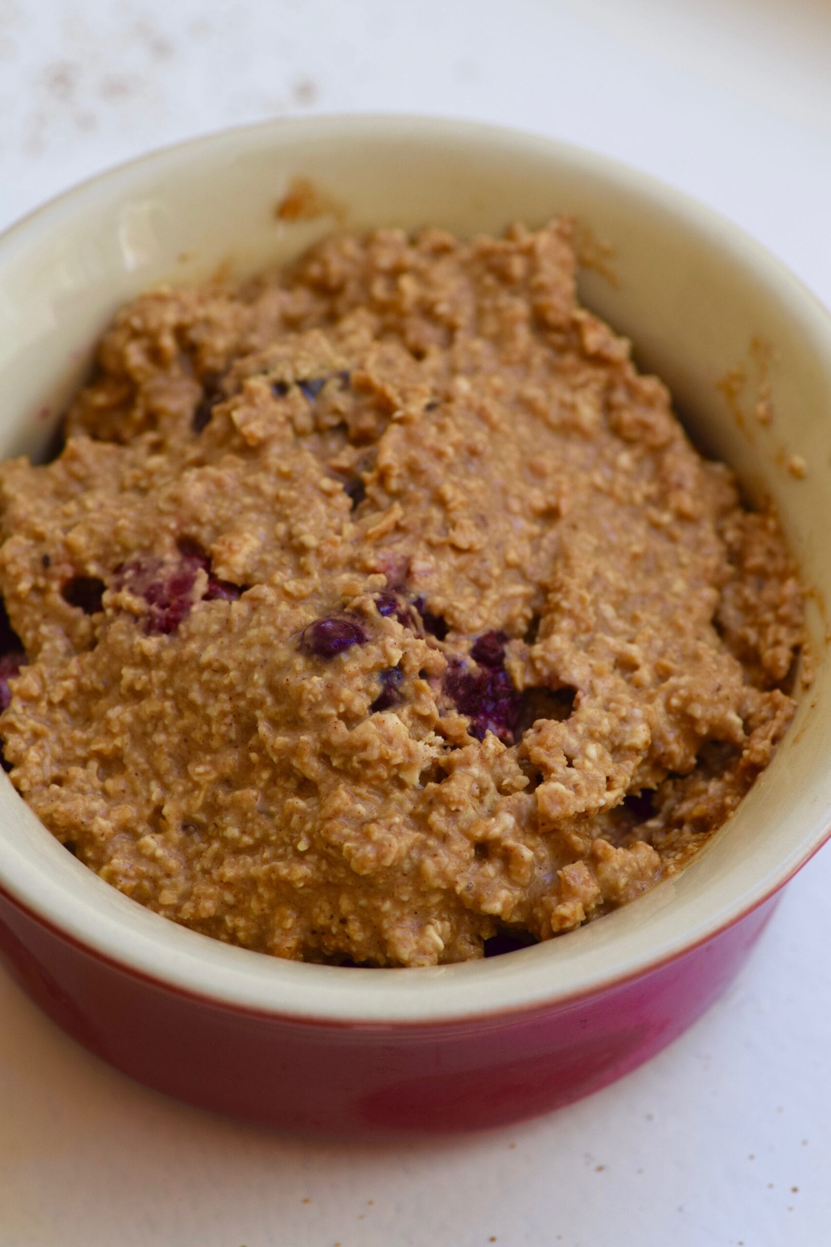 Topping blueberry cobbler filling with crust