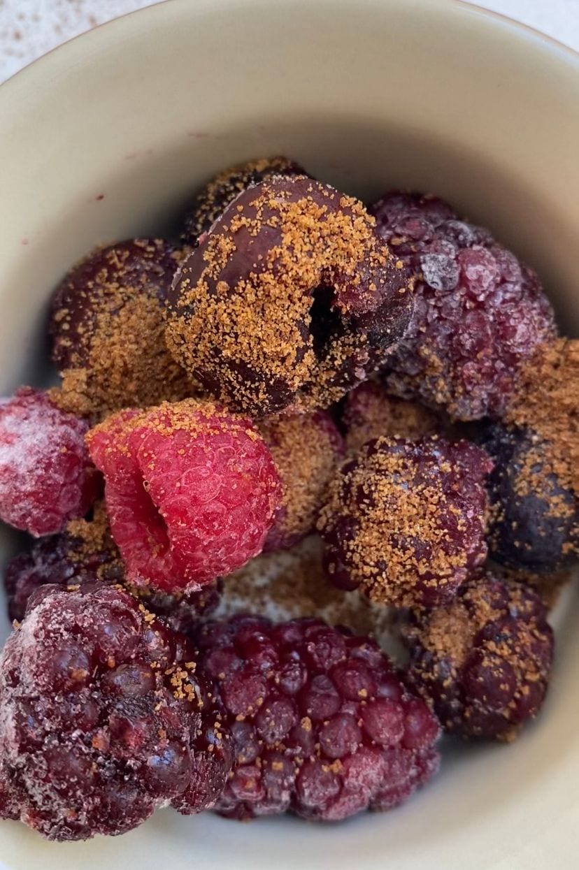 Mixing ingredients for blueberry cobbler