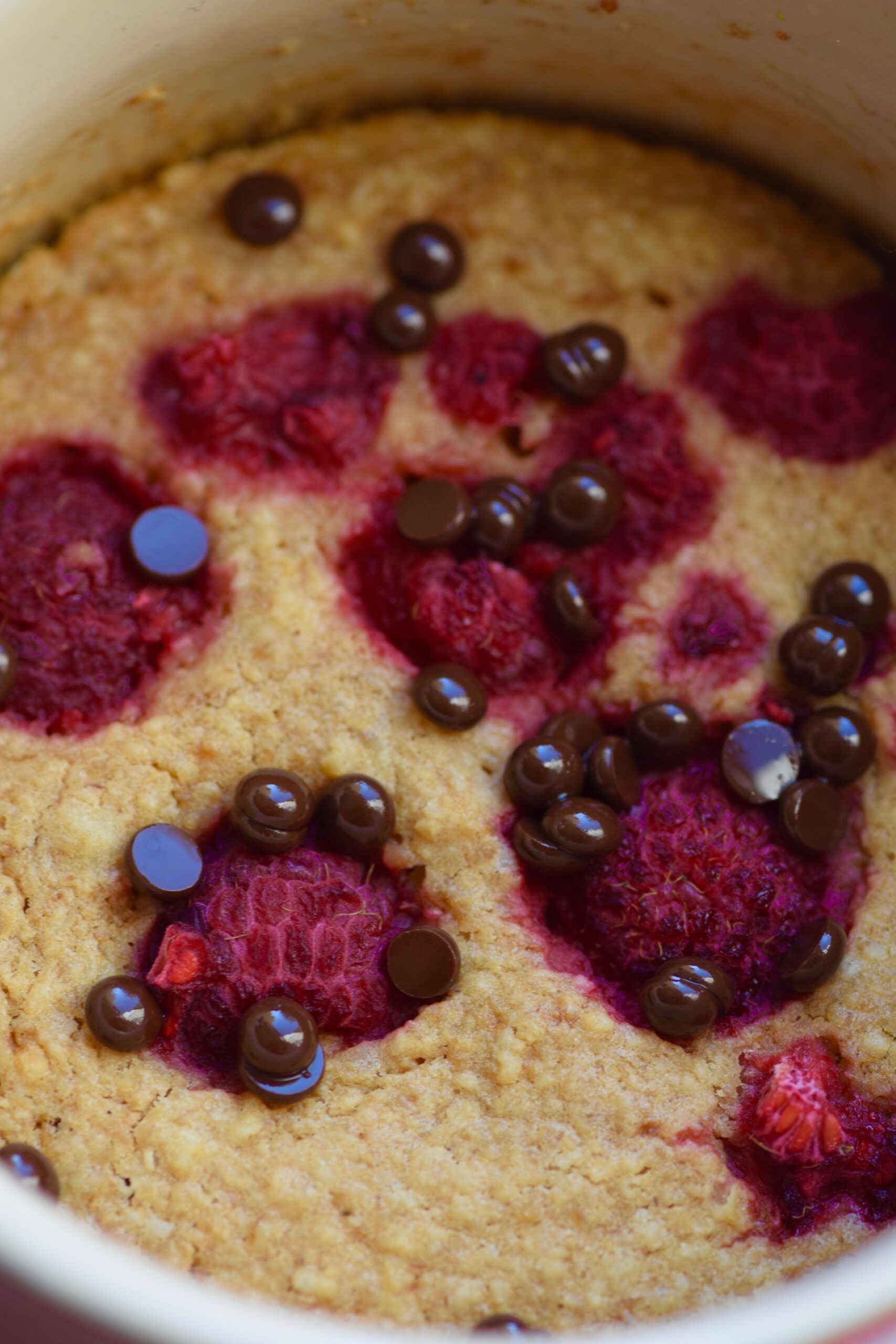 Chocolate chip raspberry mug cake