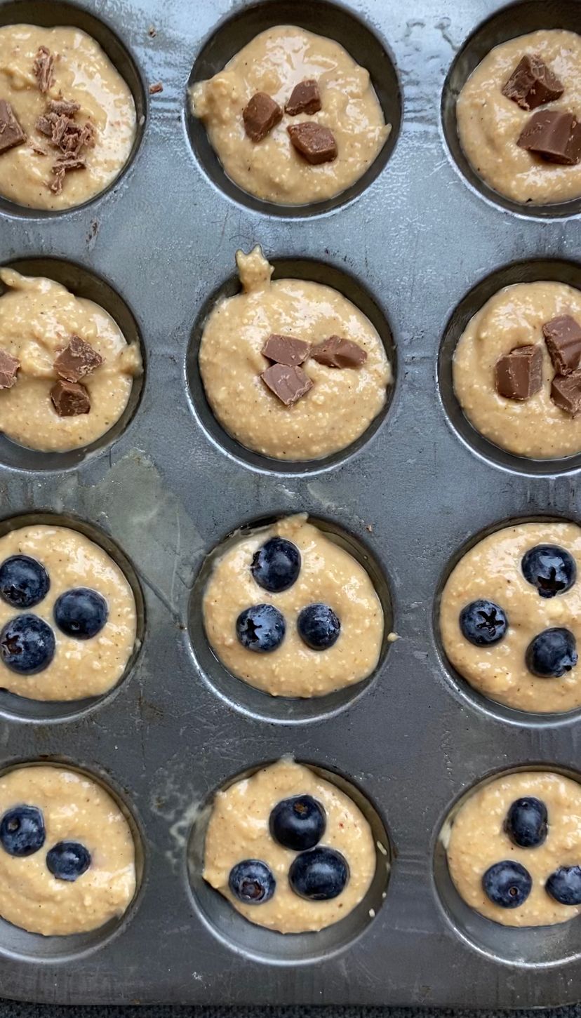 Protein muffin batter inside muffin tin