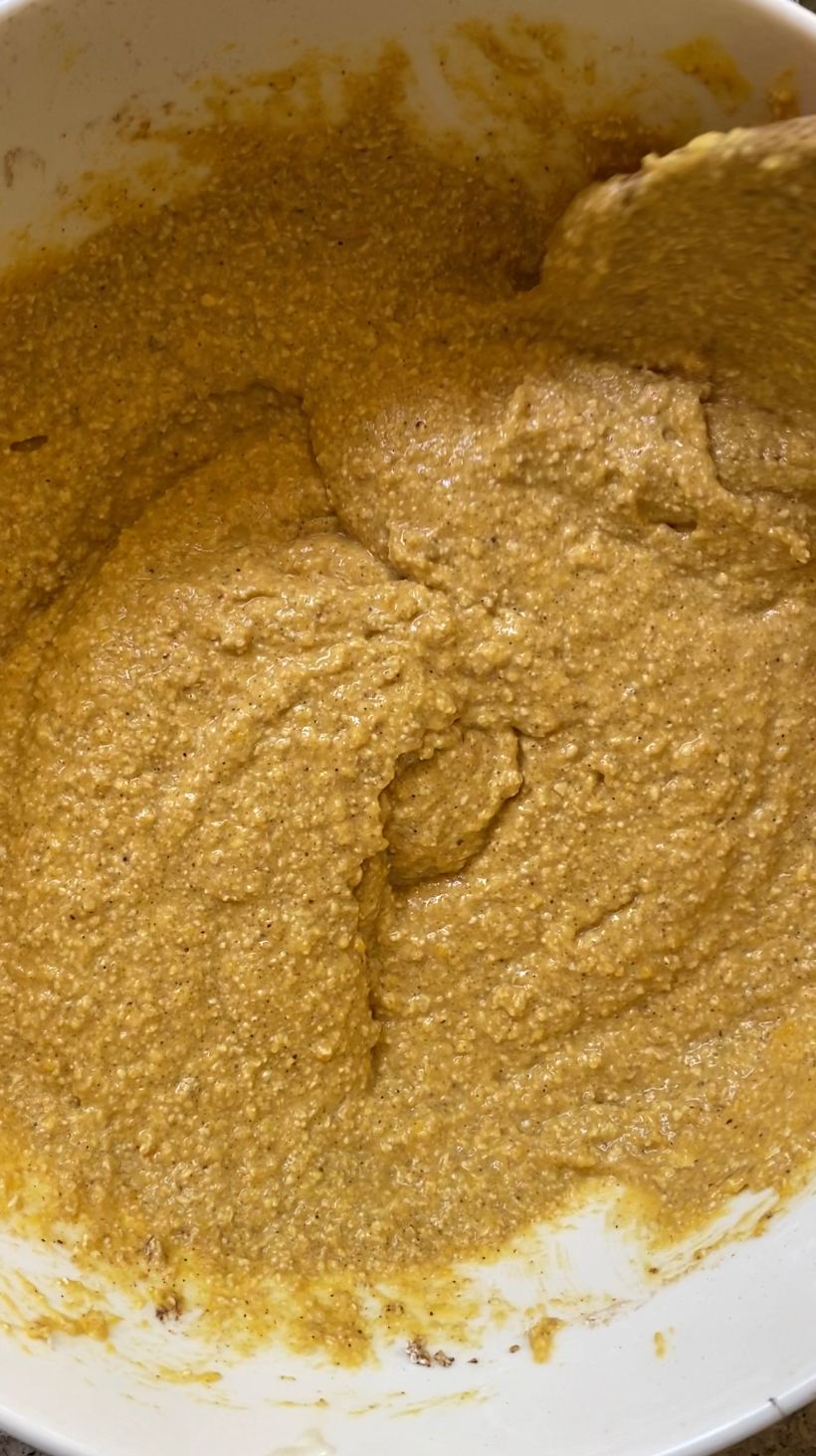 Mixing the batter of the pumpkin cheesecake loaf